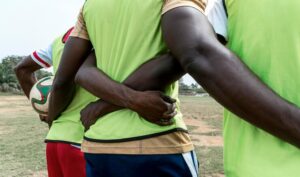 back-view-football-players_23-2148905583
